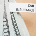 Paper with words car insurance and money. Insurance concept